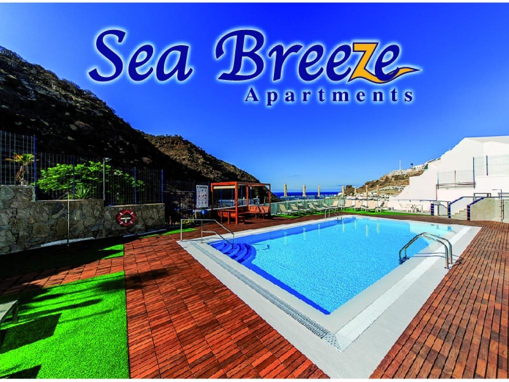 Swimming pool : Apartment to rent in Sea Breeze,  Puerto Rico, Barranco Agua La Perra, Gran Canaria  with sea view : Ref 3669