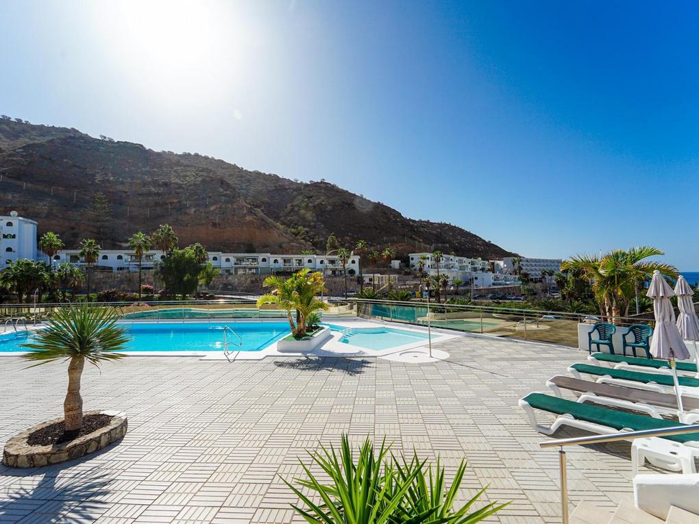 Schwimmbad : Apartment  zu kaufen in Aquacanis,  Puerto Rico, Barranco Agua La Perra, Gran Canaria mit Meerblick : Ref 05866-CA