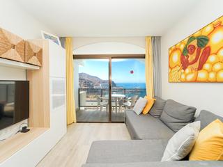 Woonkamer : Appartement  te koop in Guayarmina,  Puerto Rico, Gran Canaria met zeezicht : Ref 05785-CA