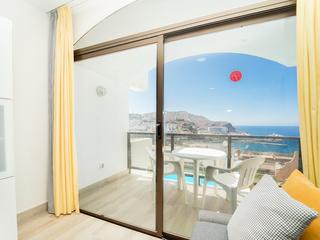 Woonkamer : Appartement  te koop in Guayarmina,  Puerto Rico, Gran Canaria met zeezicht : Ref 05785-CA