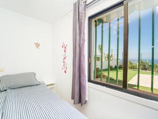 Slaapkamer : Appartement  te koop in Corona Rosa,  Puerto Rico, Barranco Agua La Perra, Gran Canaria met zeezicht : Ref 05801-CA